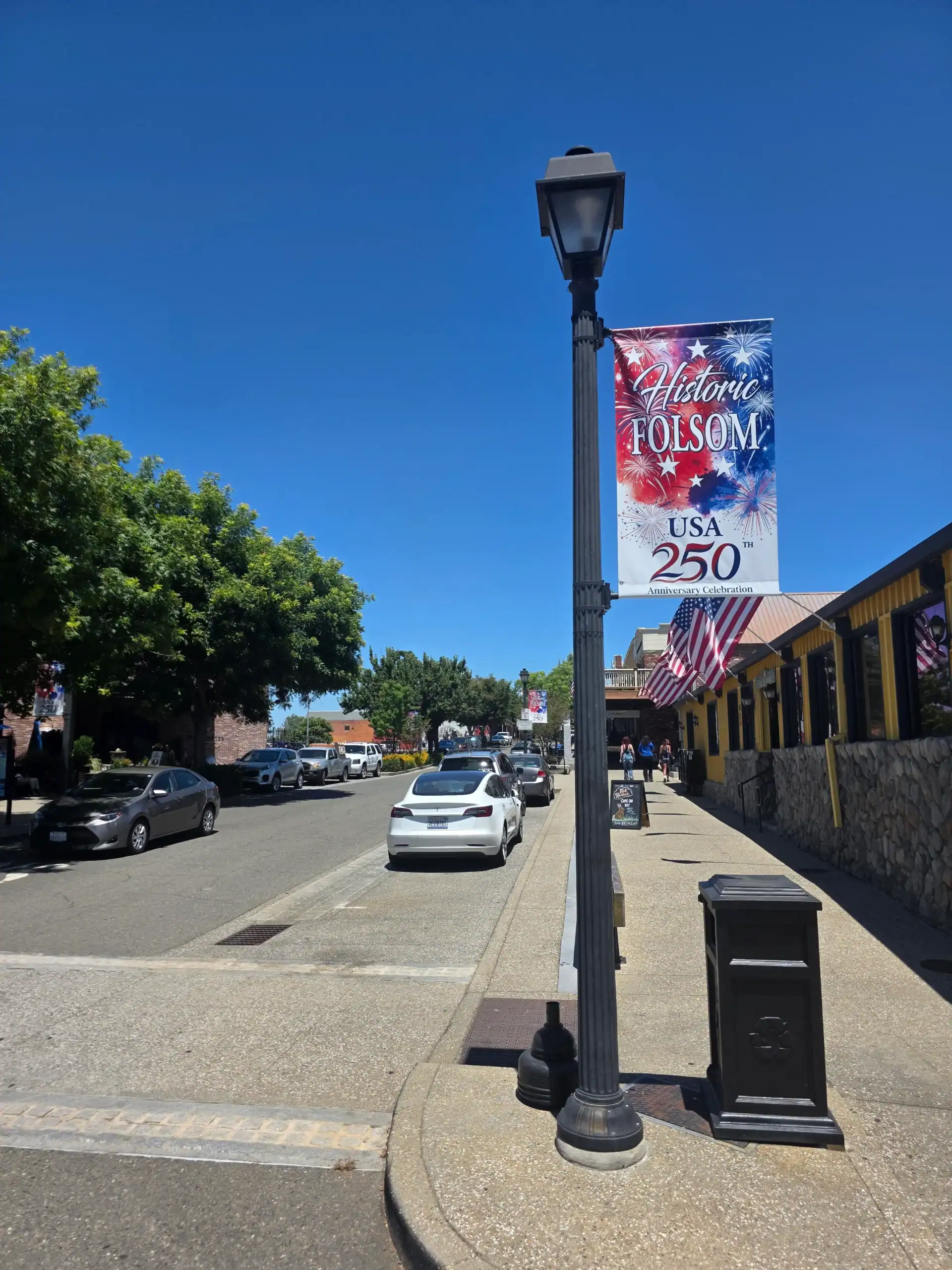Folsom Historic District Picture from Wool St. Folsom Historic District Picture down Sutter Street from Wool St. 250 Year USA Celebration sign on lightpost