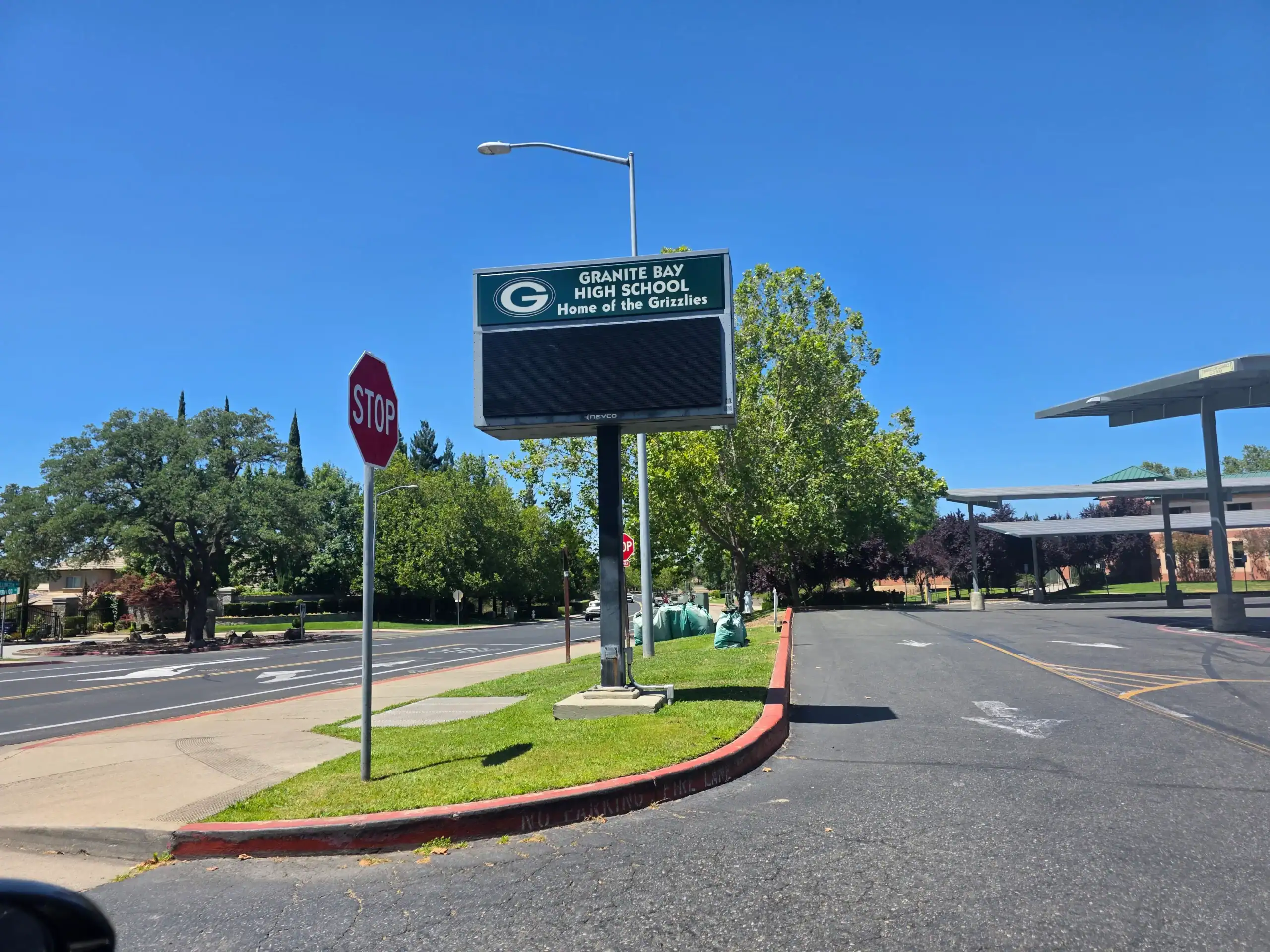 Granite Bay High School - Home of the Grizzlies entrance sign Granite Bay High School - Home of the Grizzlies - entrance sign into parking lot