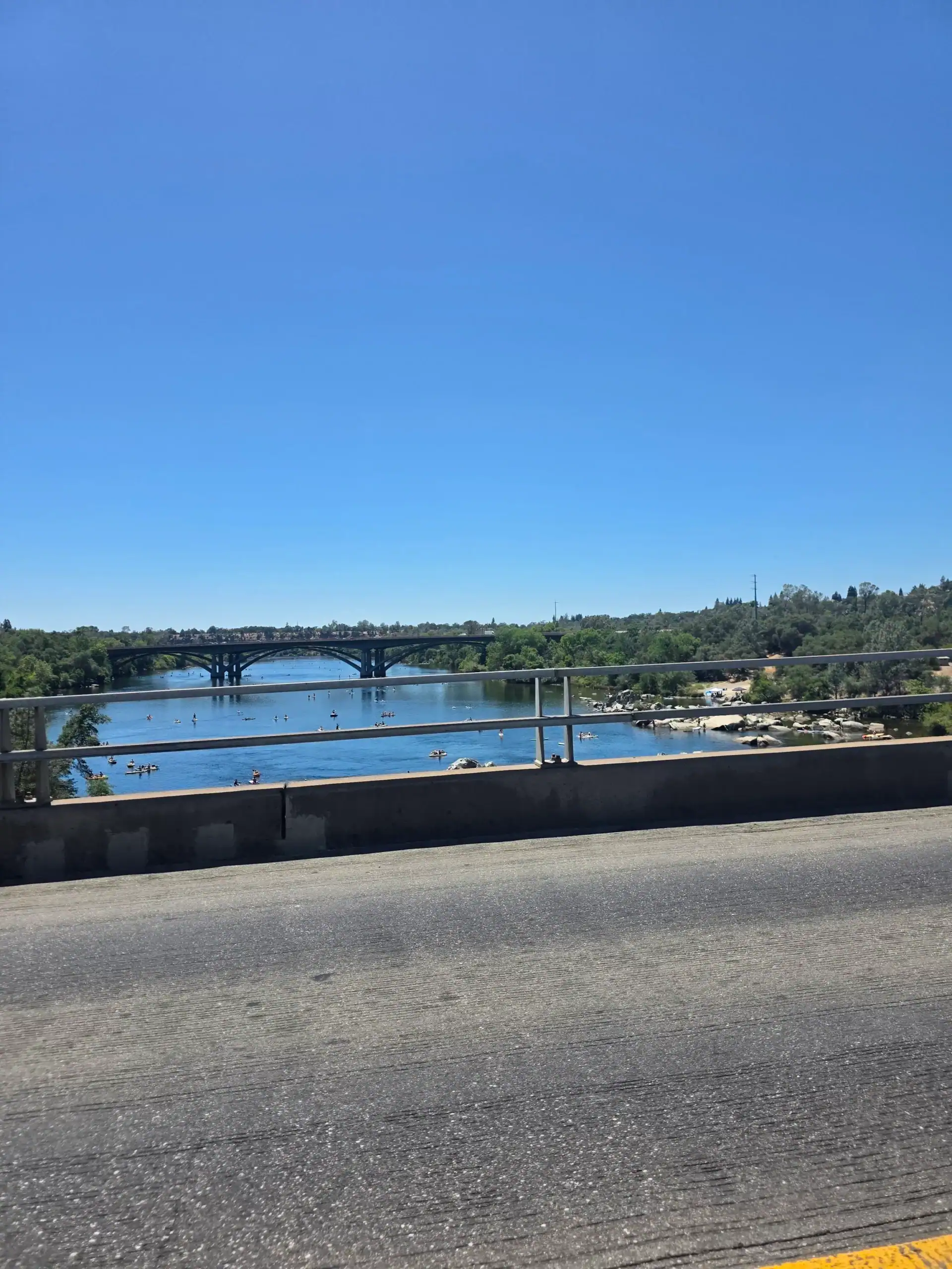 Picture of Rainbow Bridge & American River From Historic Folsom Truss Bridge Picture from Folsom Historic Truss Bride of the newer Rainbow Bridge & American River in Folsom, CA